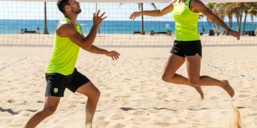 Mastering the 3-Touch Footvolley Drill: 5 Insider Techniques for 2026 Performance Gains Footvolley players executing a 3-touch drill on a beach court, showing intense focus and athleticism.